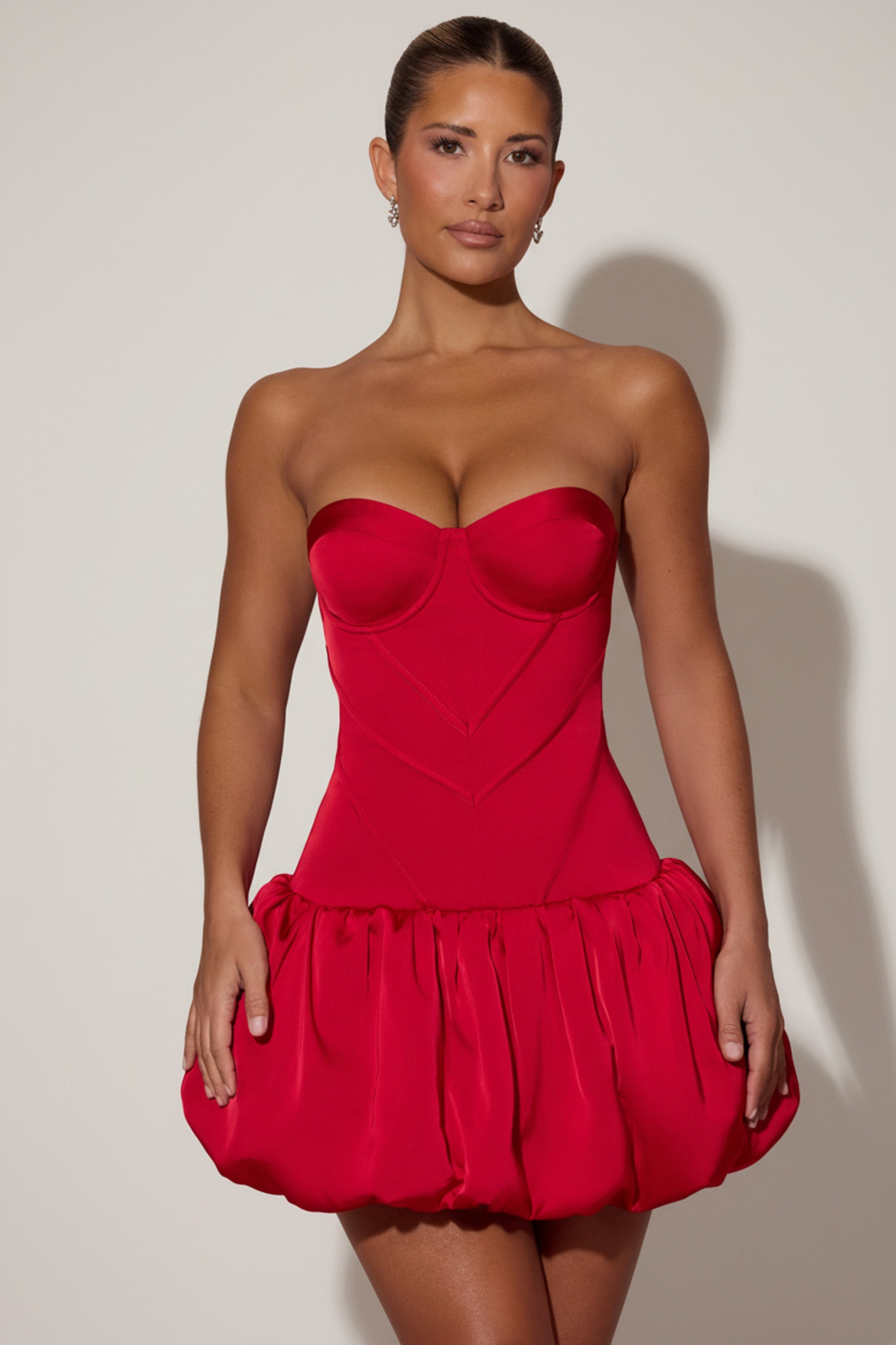 Cut-Out Bubble Hem Corset Mini Dress in Red