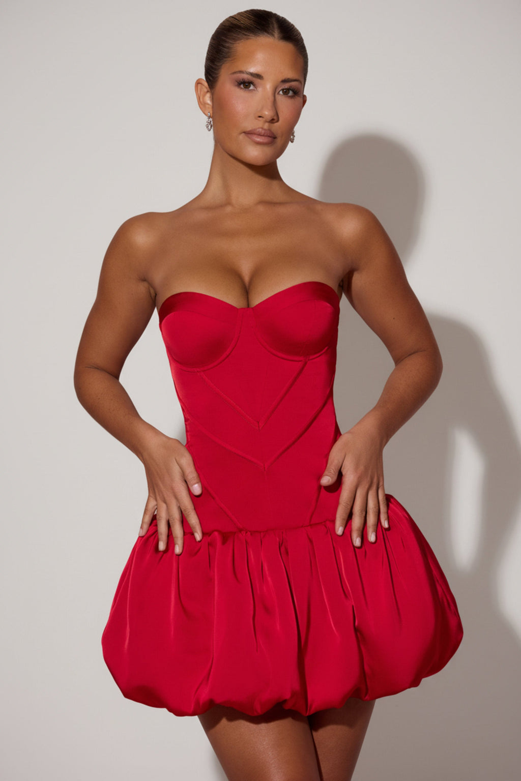 Cut-Out Bubble Hem Corset Mini Dress in Red